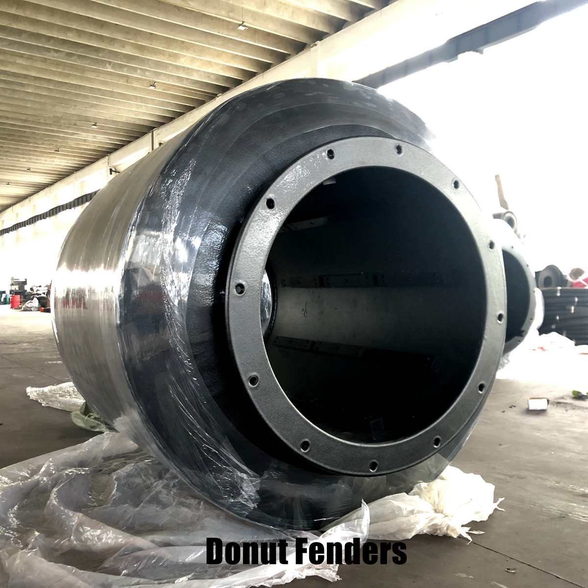 Donut fenders used for lock entrances and turning structures and approach channels